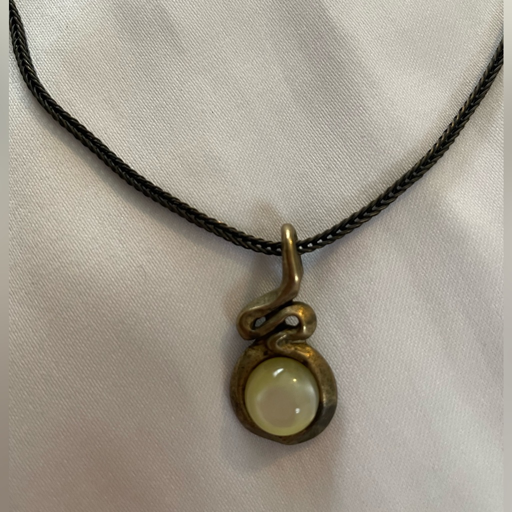 The Limited Brass And Antique Gold Tone Pendant Necklace.